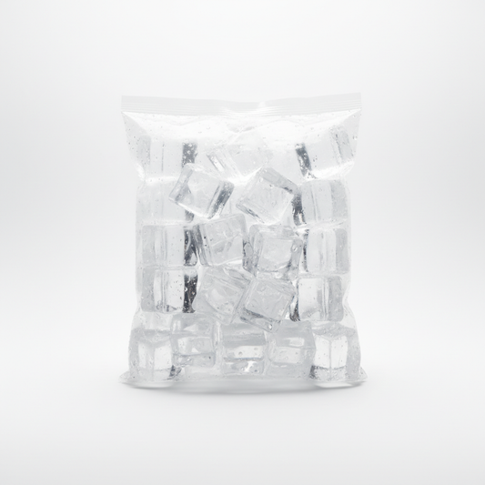 Crystal clear ice cubes in a transparent bag on white background